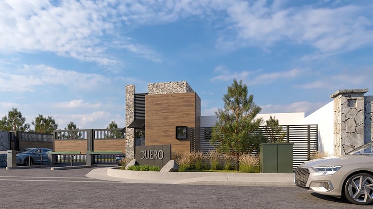 Modern residential entrance gate with brown wooden cladding and stone pillars, featuring a contemporary house design visible behind it